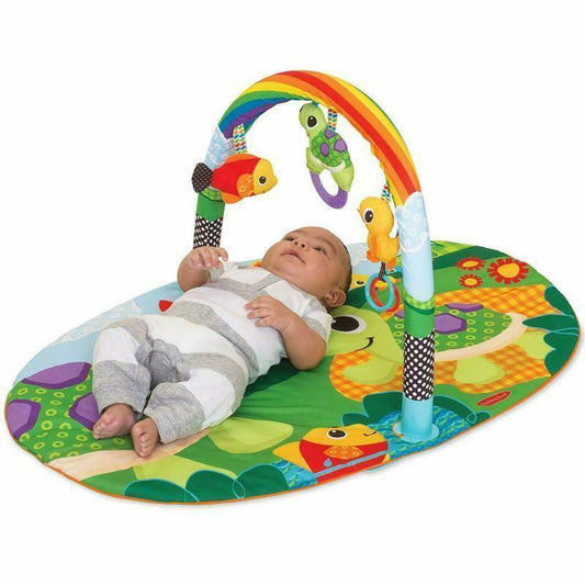 Baby using a baby play mat